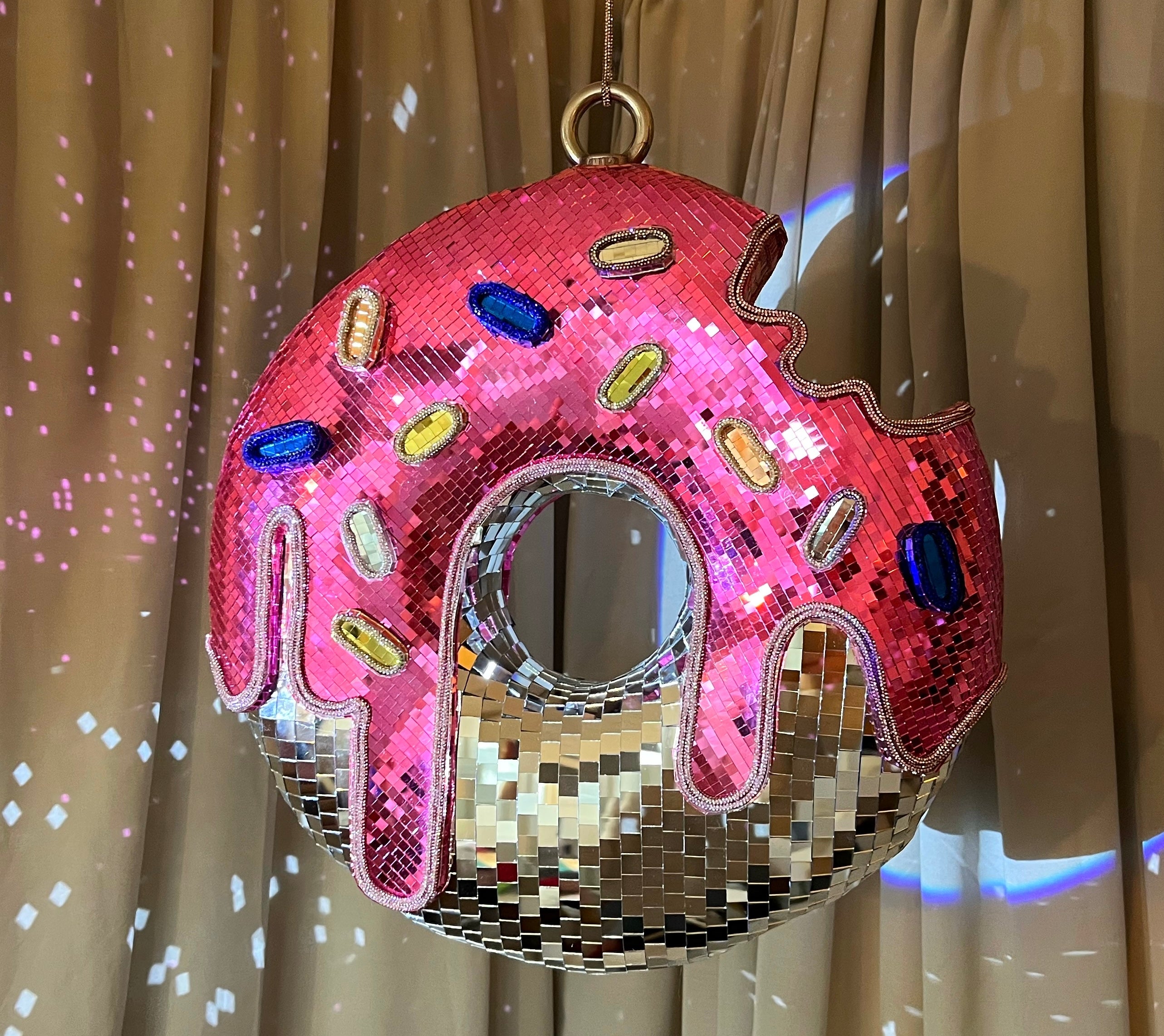 Pink donut with sprinkles Disco ball sculpture. Town Girl Disco. Disco Ball Artist. London