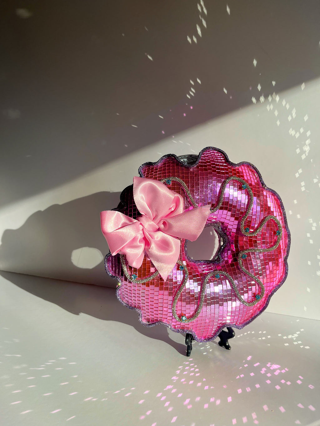 Pink disco donut with satin bow. Town Girl Disco