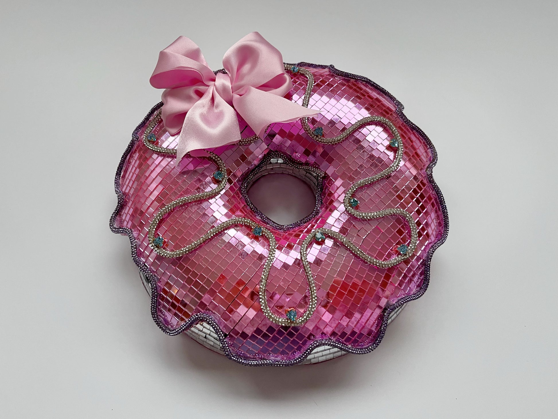 Pink disco donut with satin bow. Town Girl Disco